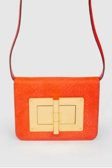 Red leather bag with gold-tone metal hardware