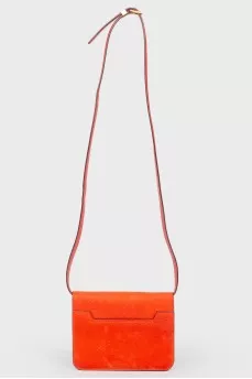 Red leather bag with gold-tone metal hardware