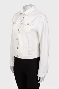White denim jacket with gold buttons
