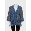 Blue cardigan decorated with piping