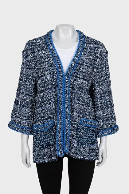 Blue cardigan decorated with piping
