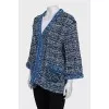 Blue cardigan decorated with piping