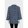 Blue cardigan decorated with piping