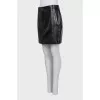 Black leather skirt with buttons