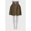 Green skirt with a belt