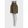 Green skirt with a belt