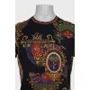 Men's black T-shirt with a signature print