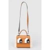 Brown bag with fur and Lego inserts