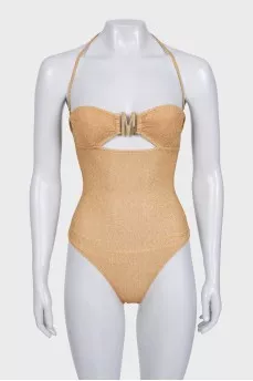 Gold swimsuit with tag