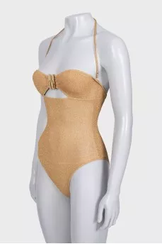 Gold swimsuit with tag