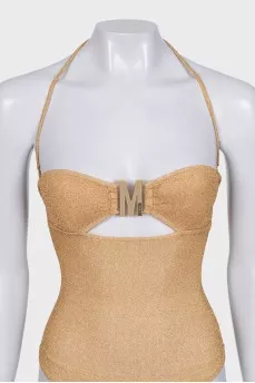 Gold swimsuit with tag