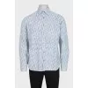 Men's shirt with branded print and tag