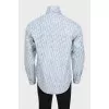 Men's shirt with branded print and tag