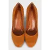 Orange suede heeled shoes