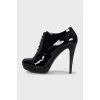 Patent leather lace-up ankle boots with heels