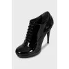 Patent leather lace-up ankle boots with heels