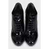 Patent leather lace-up ankle boots with heels
