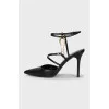 Leather slingbacks with metal decor