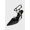 Leather slingbacks with metal decor