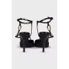 Leather slingbacks with metal decor