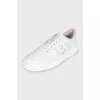 Men's white leather sneakers with logo
