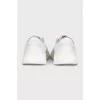 Men's white leather sneakers with logo