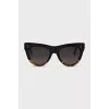 Sunglasses with a combined frame