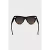 Sunglasses with a combined frame