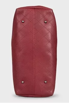 Leather bag with metal logo