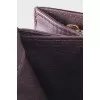 Leather crossbody with signature embossing