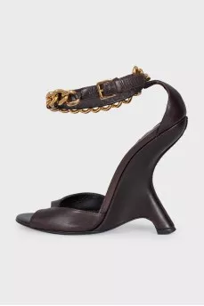 Leather sandals with a shaped wedge heel