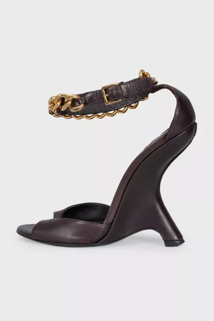 Leather sandals with a shaped wedge heel