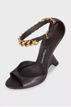 Leather sandals with a shaped wedge heel