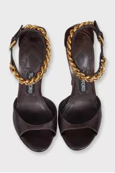 Leather sandals with a shaped wedge heel
