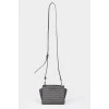Black leather handbag with metal fittings