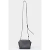 Black leather handbag with metal fittings