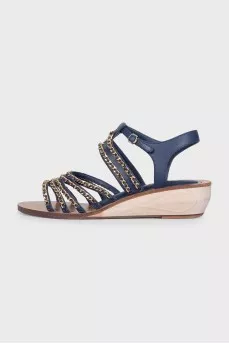 Blue leather sandals decorated with chains
