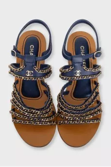 Blue leather sandals decorated with chains