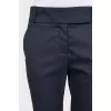 Straight-leg blue trousers with a mid-rise