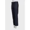 Straight-leg blue trousers with a mid-rise