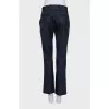 Straight-leg blue trousers with a mid-rise