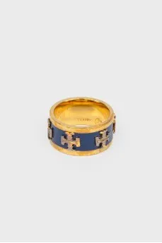 Golden ring with blue insert