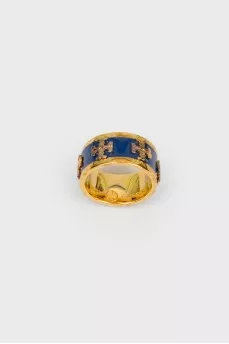 Golden ring with blue insert