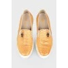 Slip-ons with embossed reptile skin