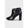 Black ankle boots with decoration