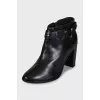 Black ankle boots with decoration