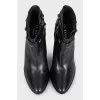 Black ankle boots with decoration