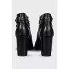 Black ankle boots with decoration