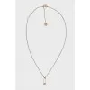 Gold necklace with a pin