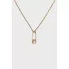 Gold necklace with a pin